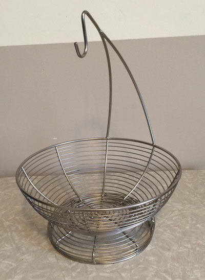 I really like this fruit basket and its built-in hook for keeping bananas unblemished, but it took up a lot of real estate on my counter, so I replaced it with a set of hanging baskets a couple of weeks ago. It'll look great on somebody's kitchen island, though.